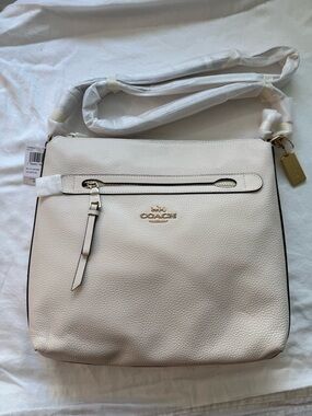Coach Pebbled Leather Crossbody Bag in Cream color
